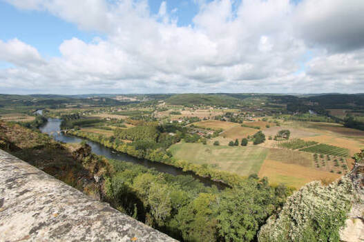 river Dordogne and its valley with trees and fields